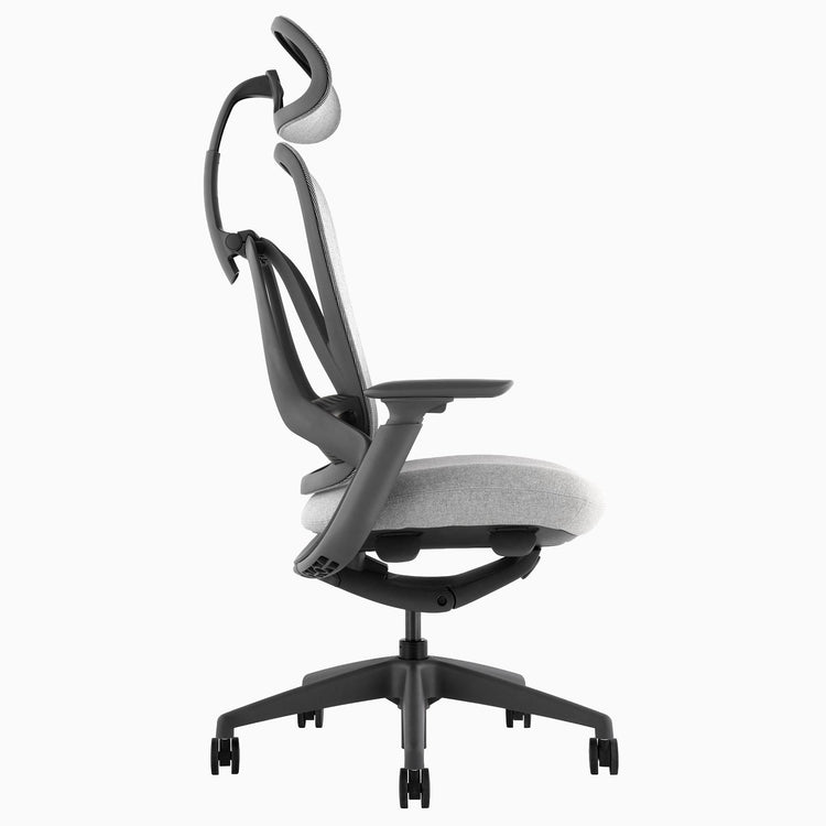 Ergonomiczny fotel biurowy Desky Pivot w kolorze szarym z zagłówkiem, profil